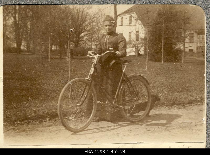 Marie Maydell with bicycle behind the manor building of Sooniste