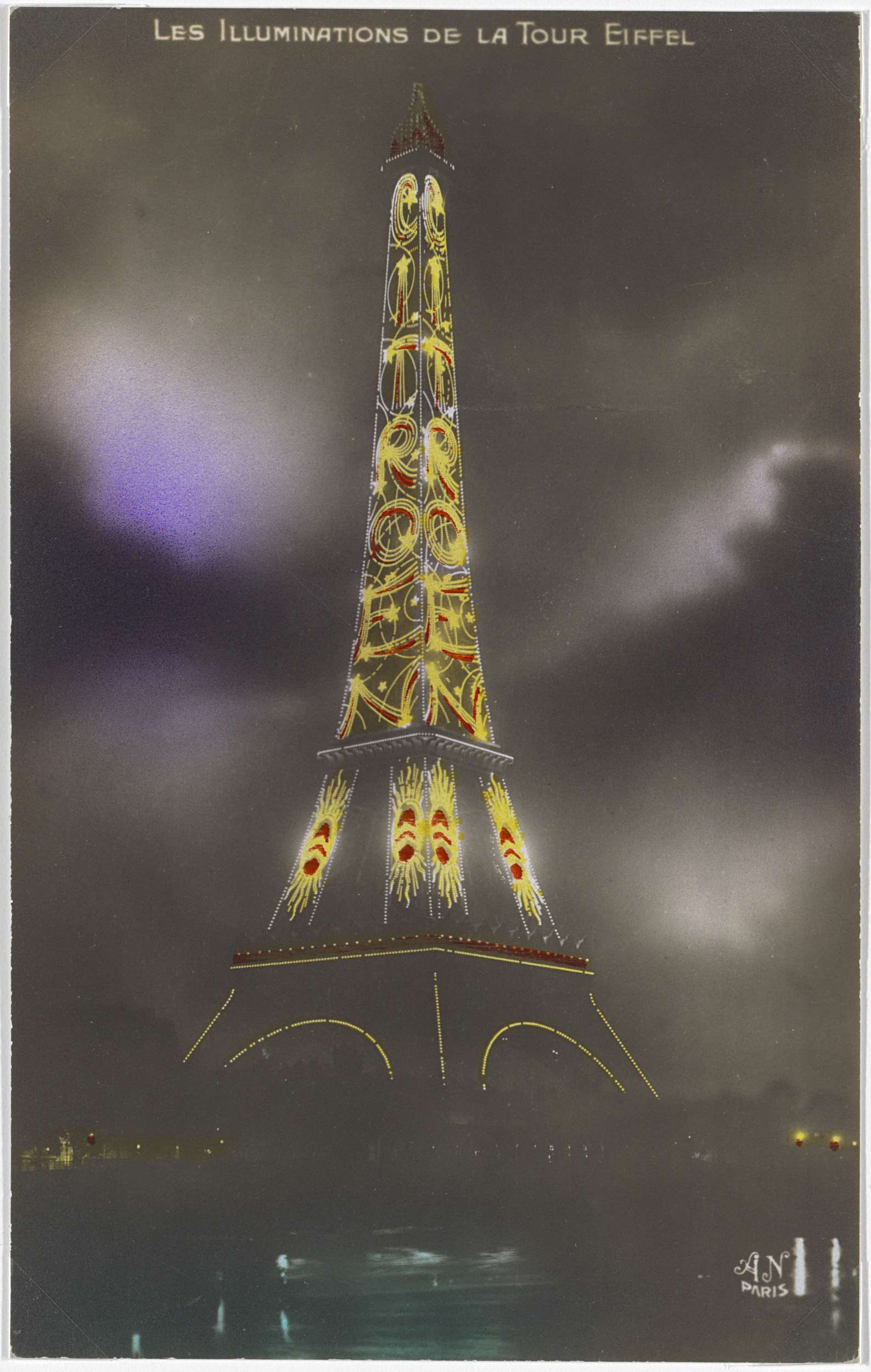 Eiffeltoren bij met at night in de verlichte letters, Les Illuminations de la Tour Eiffel