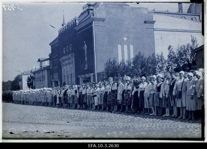 Women's defence allies and women's clothes on parade.