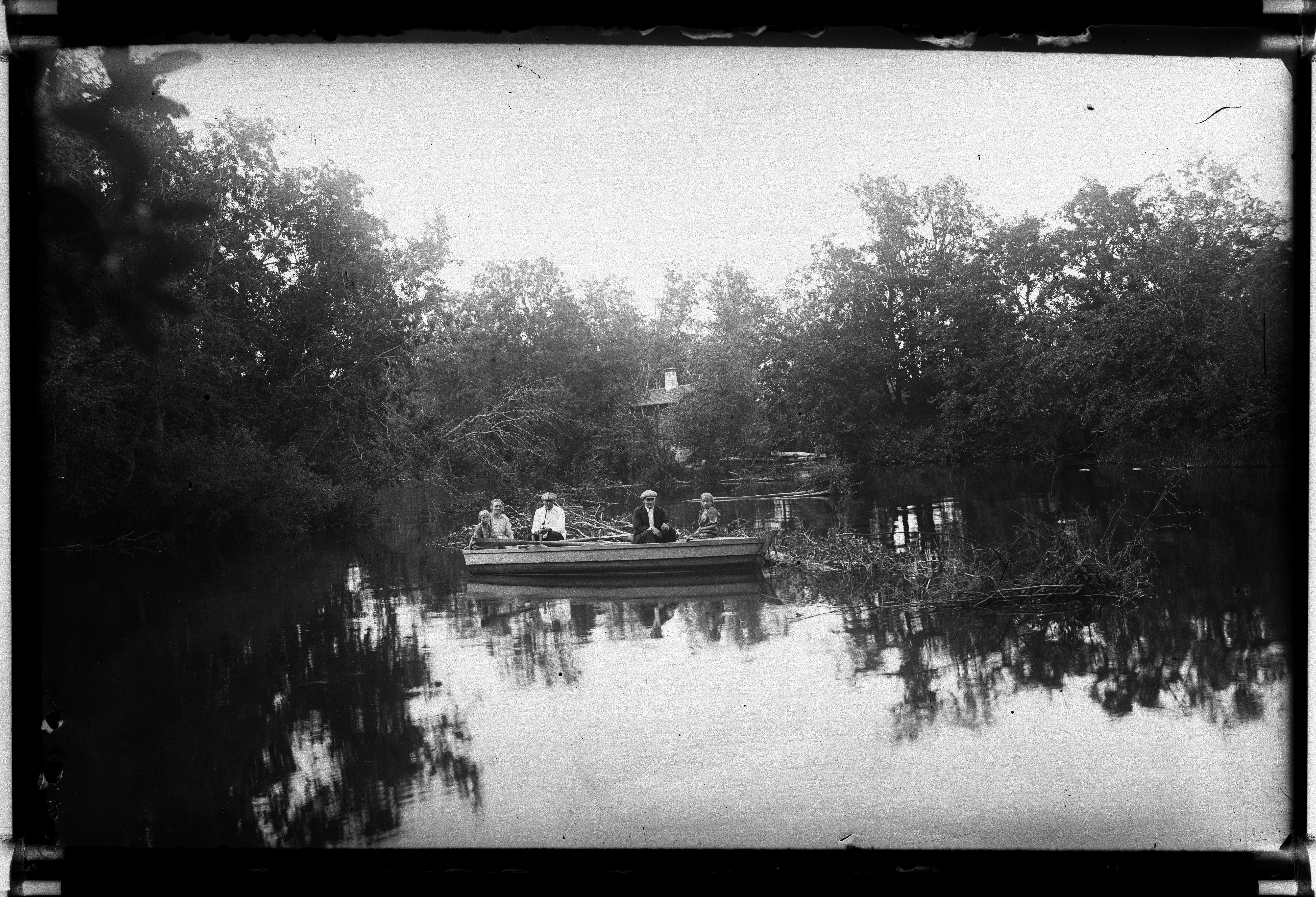 Company with a boat on the river.