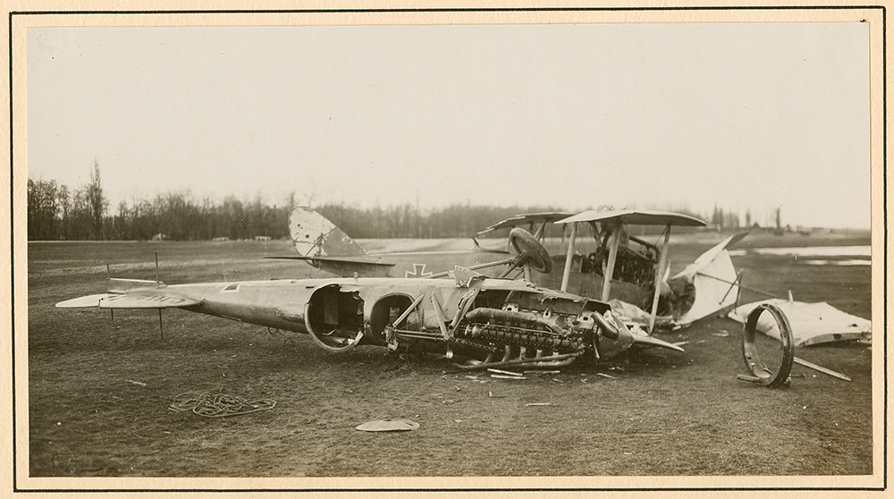[two damaged German aircraft fuselages]