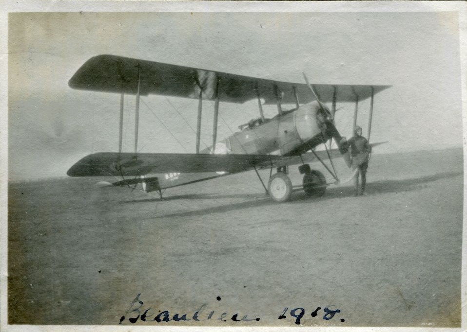 Avro 504 (B86..) bi-plane with man standing by the propeller, Beaulieu, 1918