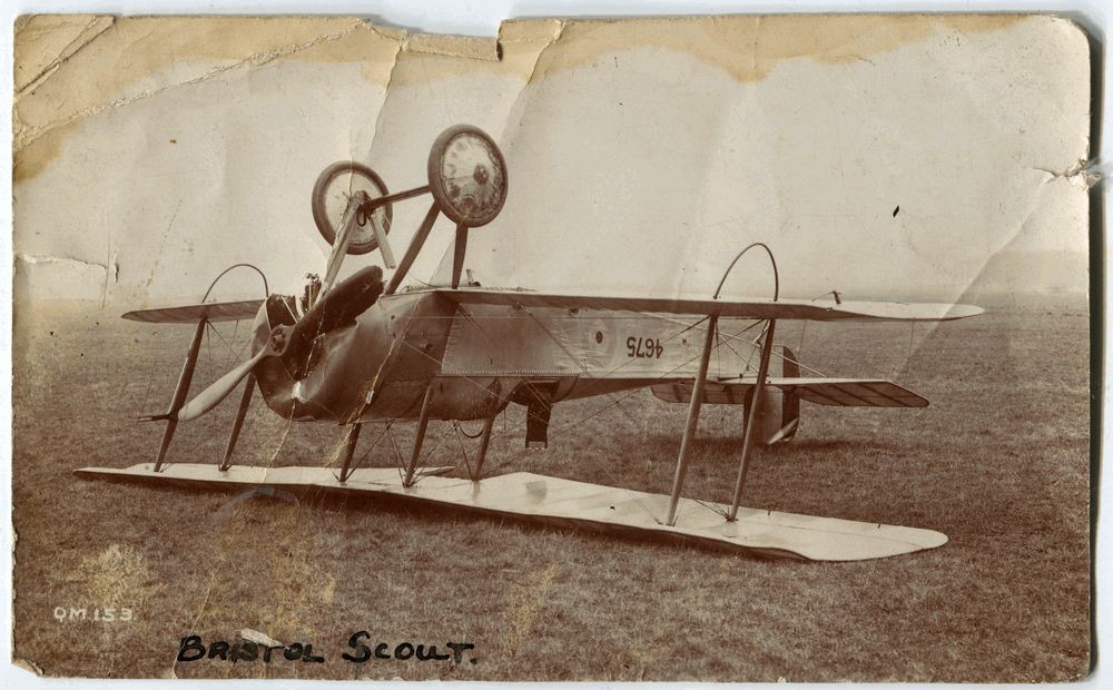 Bristol Scout (4675) bi-plane crash, upside down  - Q.M. 153