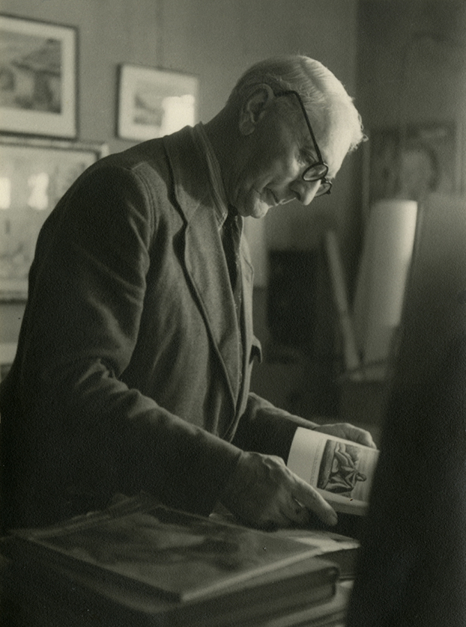 Karl Burman, poolportree Burmanist raamatut sirvimas