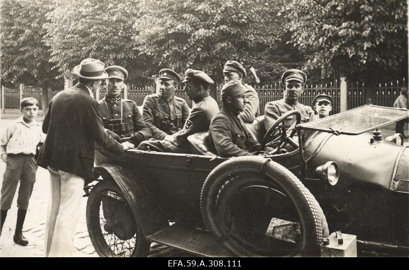 War of Liberty. Captain Karl Parts (on the back seat of the car), Chief of Staff of the division, Captain Johannes Poopuu ( next to K.Parts) and Commander of the Kuperjanov Partisan Battalion, Under captain Jaan Unt ( opposite K.Parts) [Rodenpoiss (Rogers)].