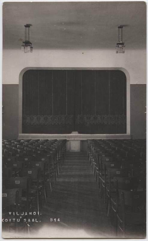 fotopostkaart, Viljandi, Jakobsoni tn 18, seltsi Koit maja, sisevaade,saal, toolid, lava, u 1925, foto J. Riet