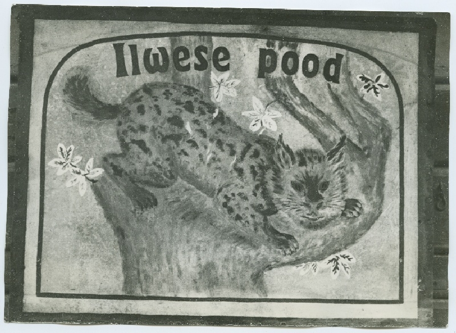 Poesilt "Ilvese pood", ilvesega puutüvel.