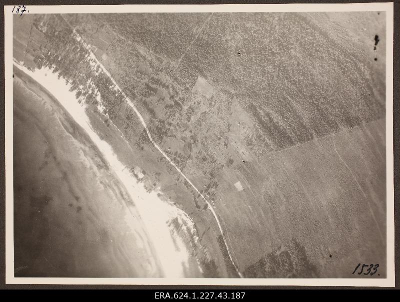 View from the air to the landscape with the beach line; photo 1. Number of photo positives in the air force auction