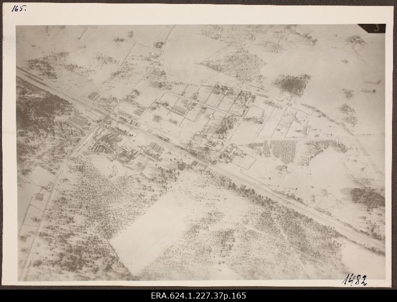 View from air to snow on the village landscape with railway; photo 1. Number of photo positives in the air force auction