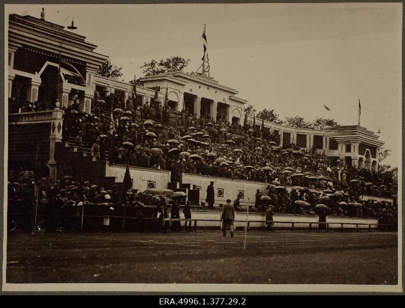 View of Kadrioru stadium audience bar, viewers with rain shelters. Possible that the opening of the Kadrioru Stadium on June 13, 1926