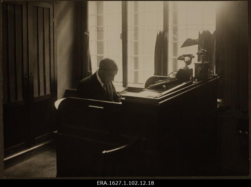 Economics manager J. Kollist behind the desk