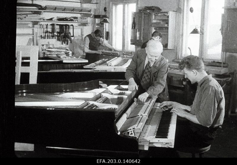 Ernst Hiis, the designer of the Tallinn Klaver factory, is supervised by Eduard Kiviking.