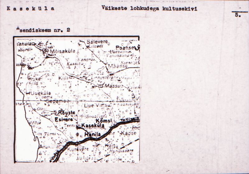 Negatiiv. Kaseküla väikeste lohkudega kultusekivi.
Ü.p. 1976.