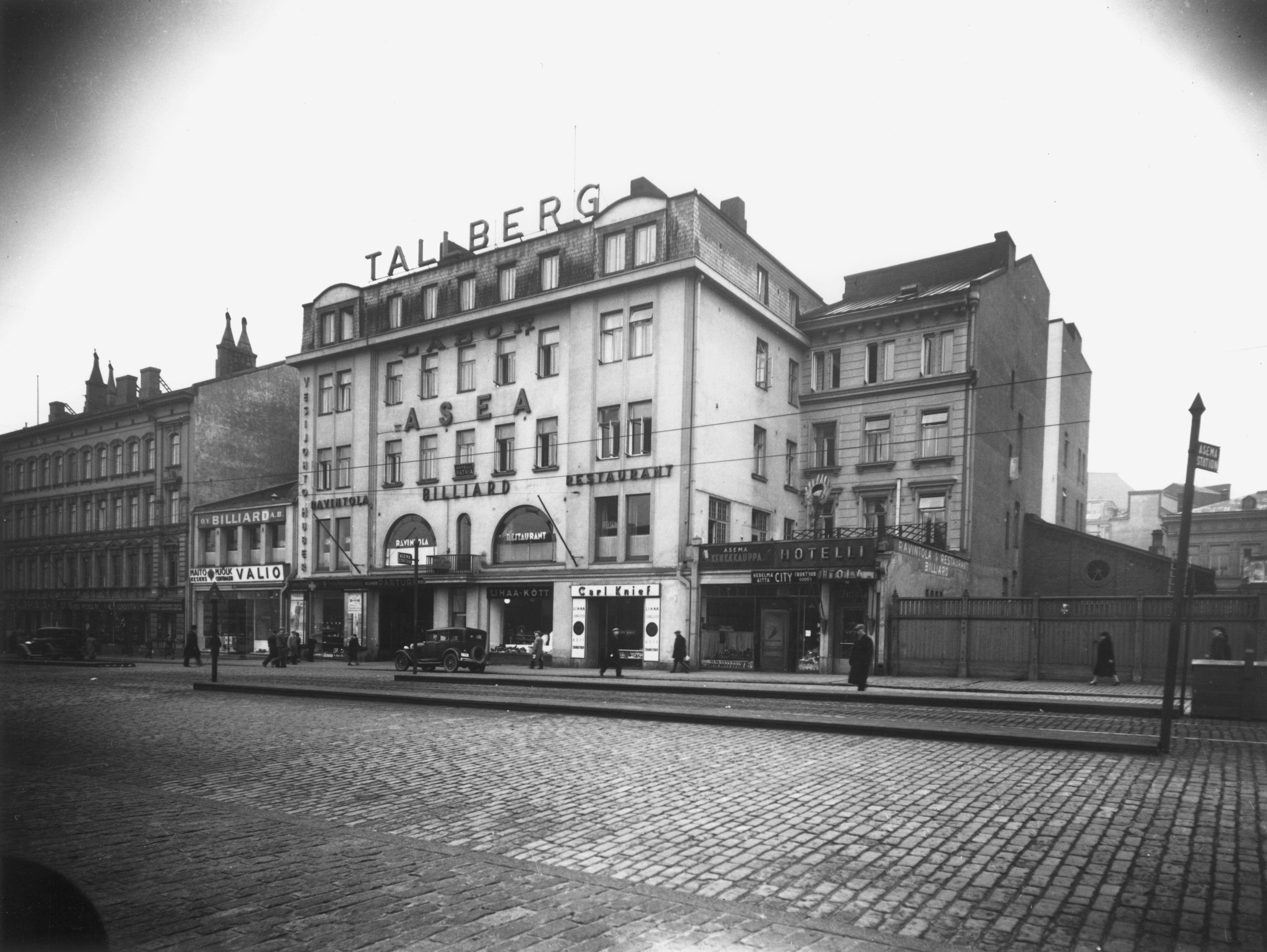 Kaivokatu 8, 6. Rakennuksessa yritykset Keskusosuuskunta Labor, Tallberg, Asea, ravintola Billiard, vesijohtoliike Huber, lihakauppa Carl Knief.