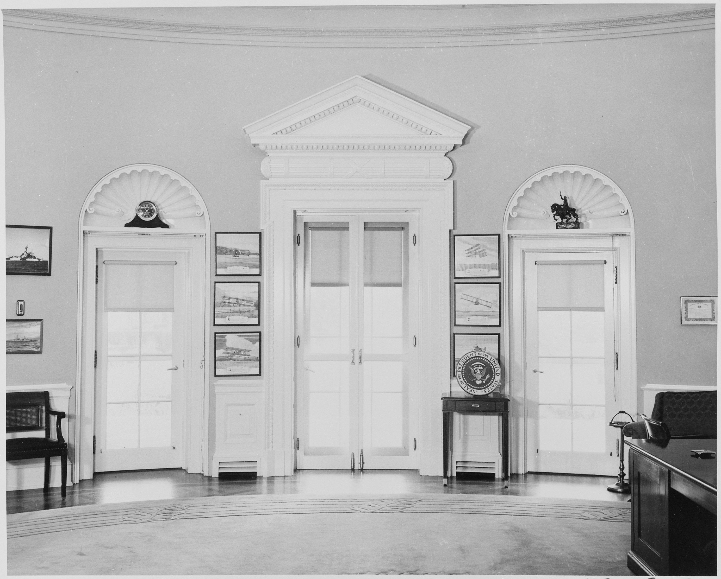 Photograph of doorways leading outside in President Truman's Oval Office at the White House.
