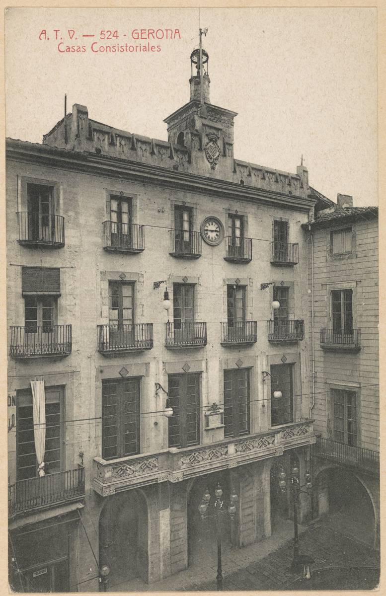 Gerona. Consistory Houses - Facade of the City Council of Girona, in the Plaza del Vino. On the left, the Café d’ en Vila and on the right, the Carles house