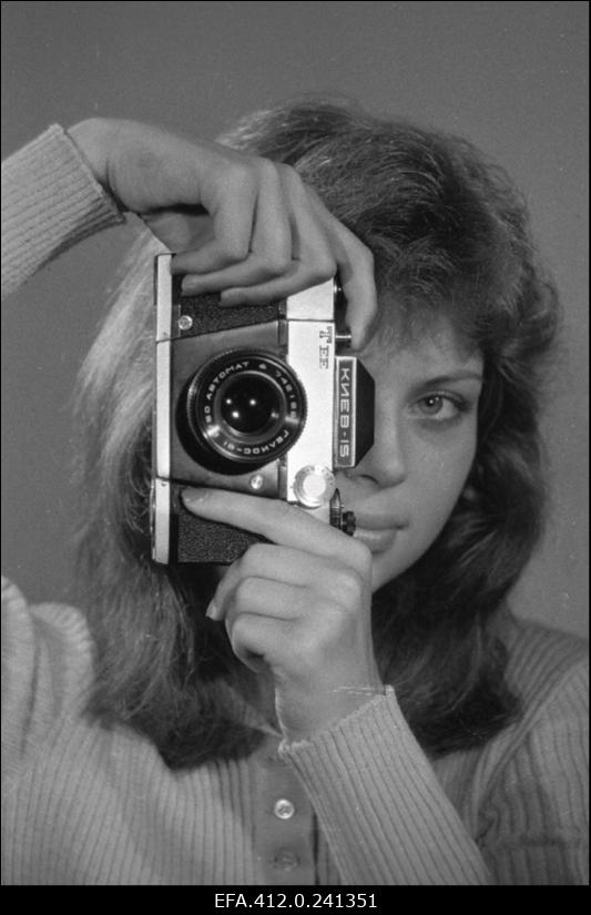 Preili Priilinn fotoaparaadiga (reklaam).