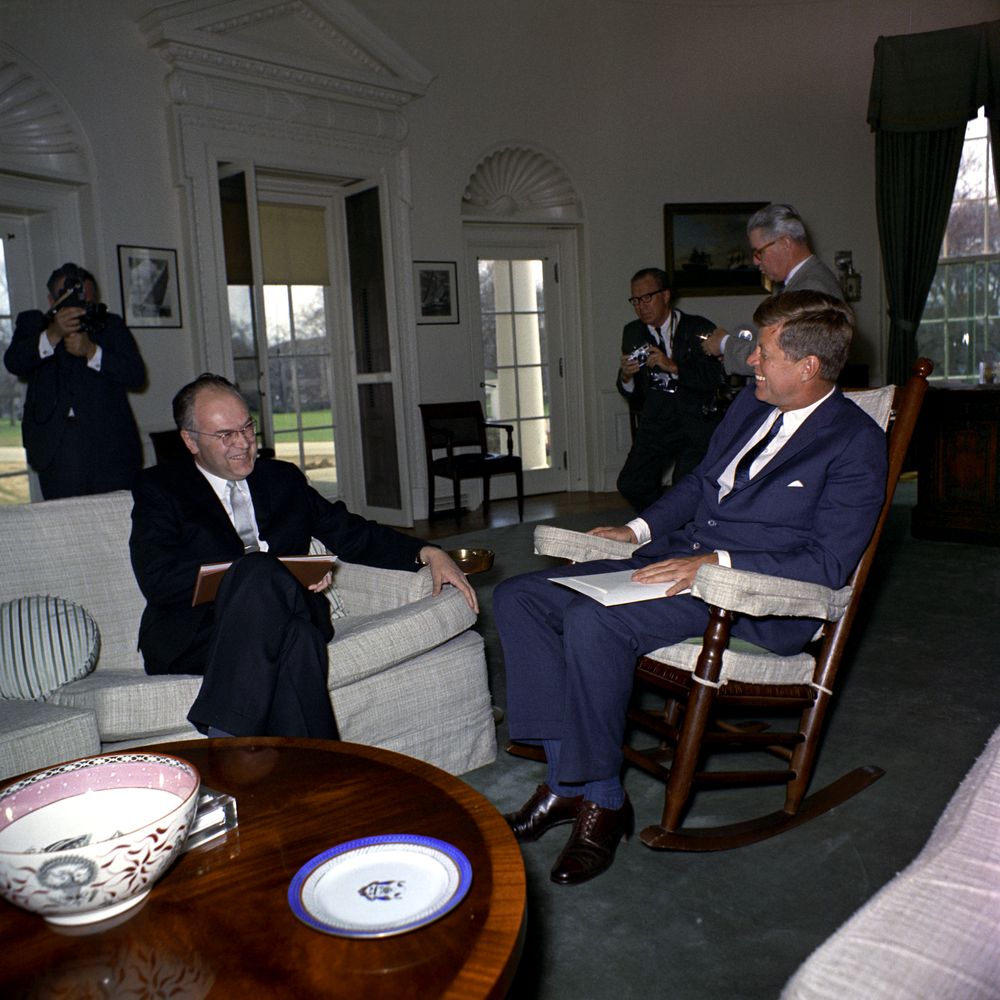 John F. Kennedy, Anatoly Dobrynin - President John F. Kennedy (in rocking chair) laughs with Ambassador of the Soviet Union (USSR), Anatoliy Fedorovich Dobrynin (left), during a meeting in the Oval Office of the White House, Washington, D.C
