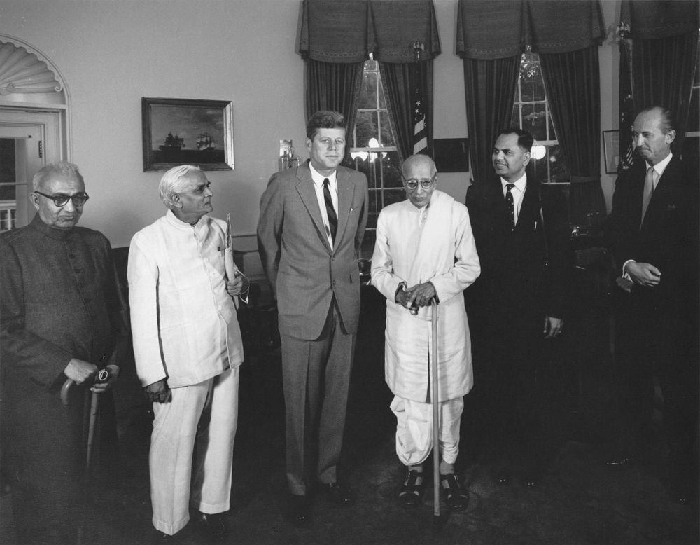 President John F. Kennedy with Members of the Gandhi Peace Foundation at Oval Office, White House, Washington, D.C - AR7511-A. President John F. Kennedy with Members of the Gandhi Peace Foundation
Accession Number: AR7511-A
Date(s) of Materials: 28 September 1962

Description: President John F. Kennedy meets with delegates from the Gandhi Peace Foundation in New Delhi, India, to discuss nuclear disarmament. Left to right: former member of the Indian delegation to United Nations General Assembly, Benegal Shiva Rao; former Minister of Information and Broadcasting of India, Ranganath Ramachandra Diwakar; President Kennedy; former Governor-General of India, Chakravarti Rajagopalachari; unidentified; U.S. Chief of Protocol, Angier Biddle Duke. Oval Office, White House, Washington, D.C.