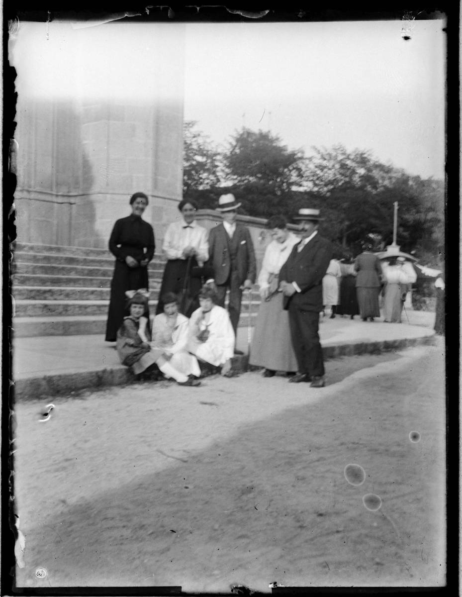 [Portrait] - Group portrait on the stairs of an unidentified church.