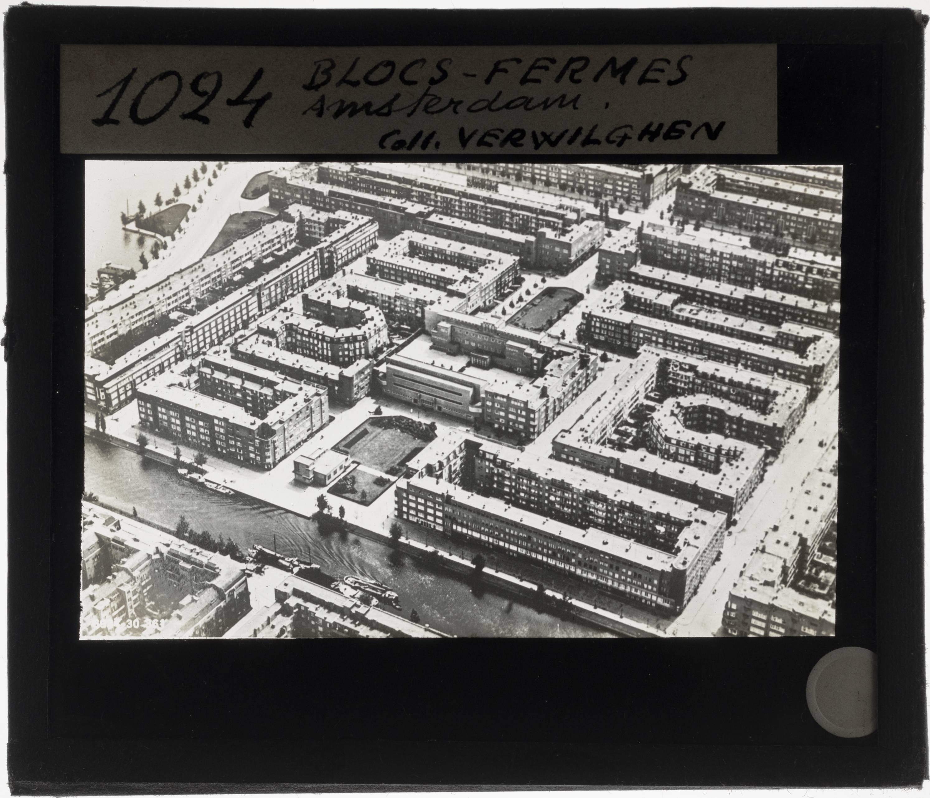 Amsterdam. Aerial photograph of a city block with tenement buildings - KU Leuven. Glass slides landscape, architecture and design. Université de Louvain, between 1839 and 1939. Photographer unknown. Added information on slide. Date/Creation: 20th century. Current location: Netherlands, Amsterdam. EuroPhot. Art History. 20th century. Architecture. City. EuroPhot. Art history. 20th century. Architecture. City. EuroPhot. Social history. 20th century. Architecture. City. EuroPhot. Social history. 20th century. Architecture. City.