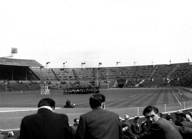 Wembley Stadium interior 1956 - Wembley Stadium, 1956 - A brass band entertains the crowd before the start of the Rugby League Cup Final.