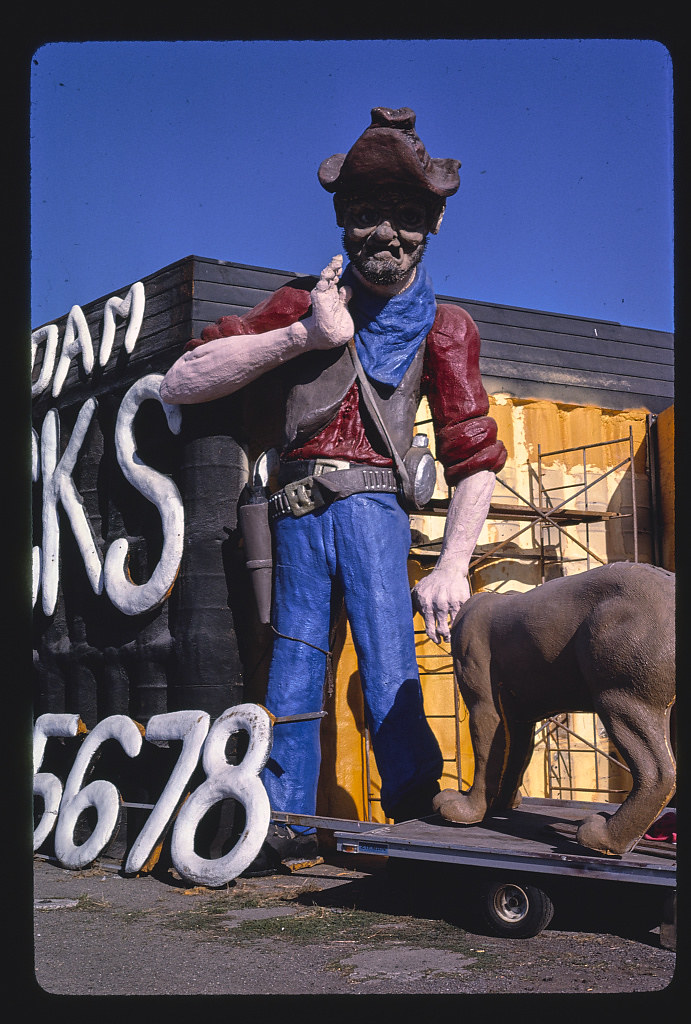 Spray foam trucks prospector statue and sign, entire statue detail, Frontage Road, I-5, Albany, Oregon (LOC)