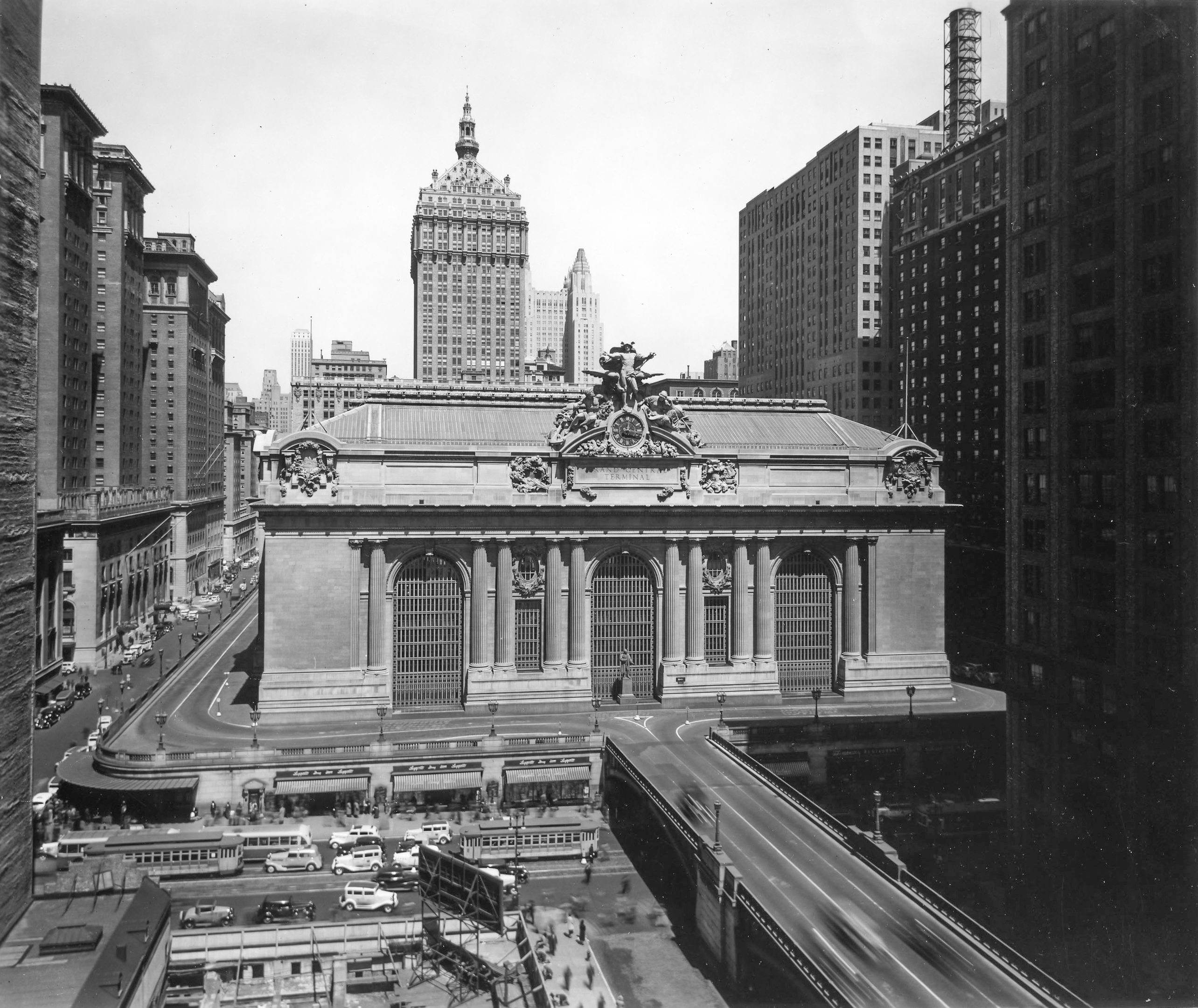 The New York Grand Central Terminal - "Exterior view of the south side of Grand Central Terminal with the Helmsley Building (formerly the New York Central Building) in the background."