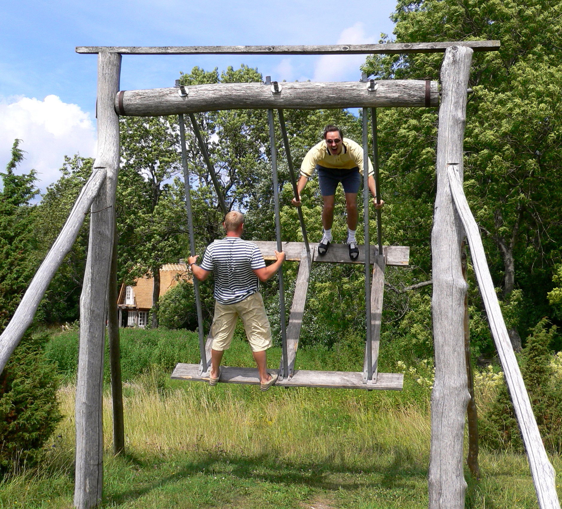 Estonian great swing - Traditional Estonian swing at Pädaste Manor. When the top bar is missing, the serious fun is to do a full circle.