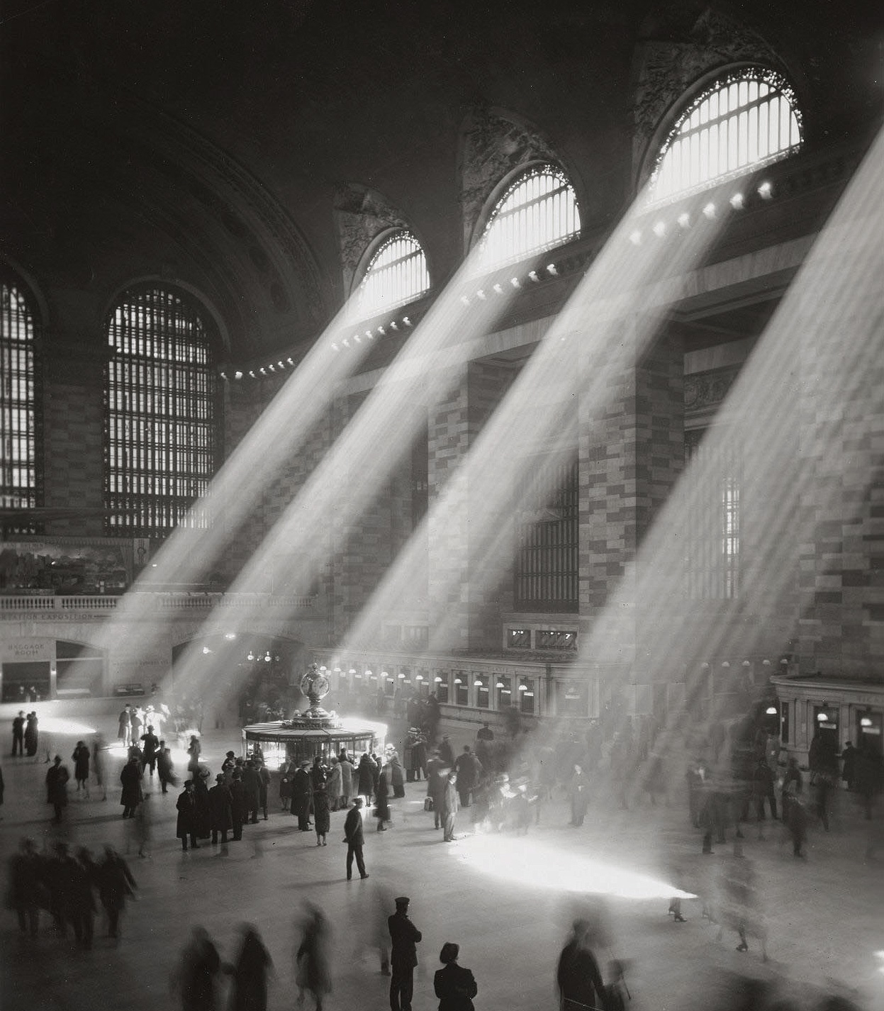 Grand Central rays of sunlight - Rays of sunlight beaming down on the Main Concourse floor of Grand Central Terminal. Many similar photos exist; this is the first one proven to be freely licensed. Unknown author, unknown date, published in 1950.