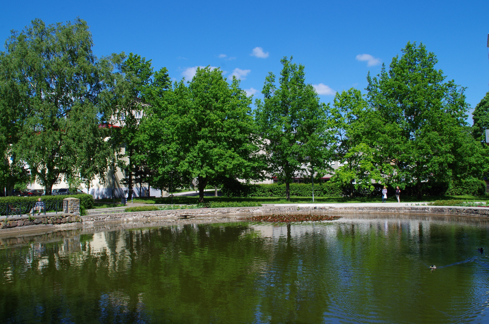 View of apartments in Tartu on Tiigi Street and fire fighter clockboard rephoto