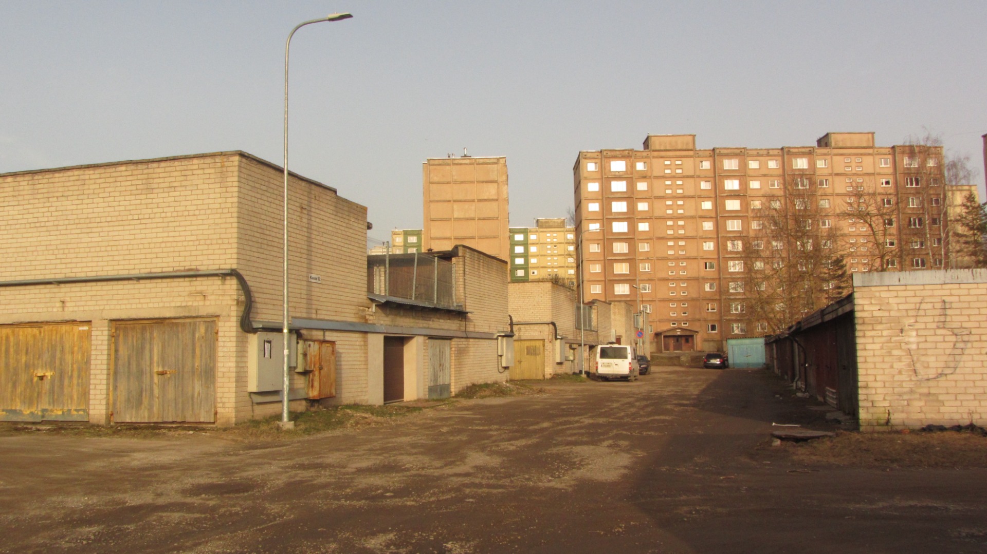 Cooperative magazines of Tartu, Kuuse Street. Construction of the foundation of the high building in the rear plan. Look out of town. rephoto