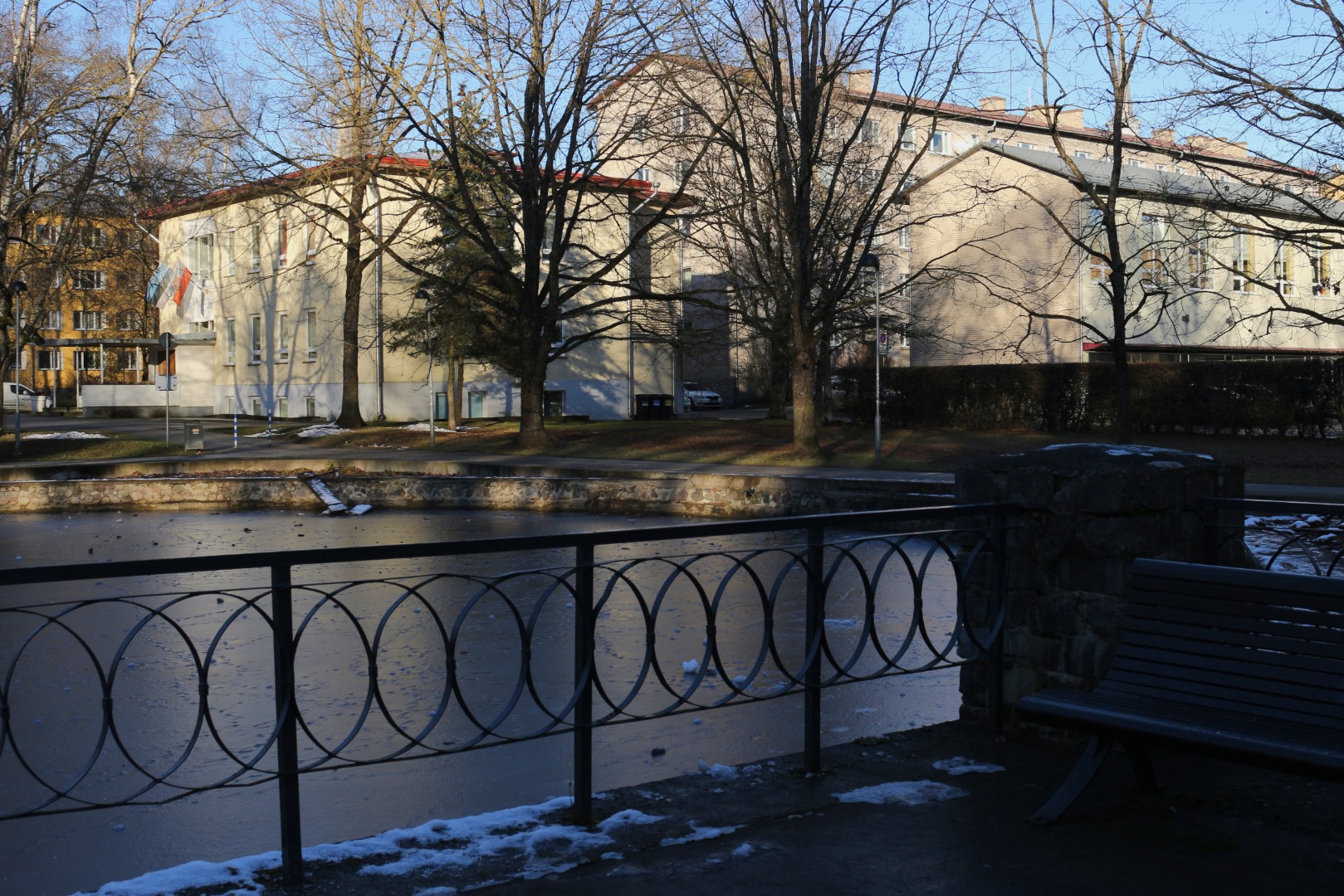 Theatre "Vanemuise" is a tiny park next to a small house, new houses on the back of Tiigi Street rephoto