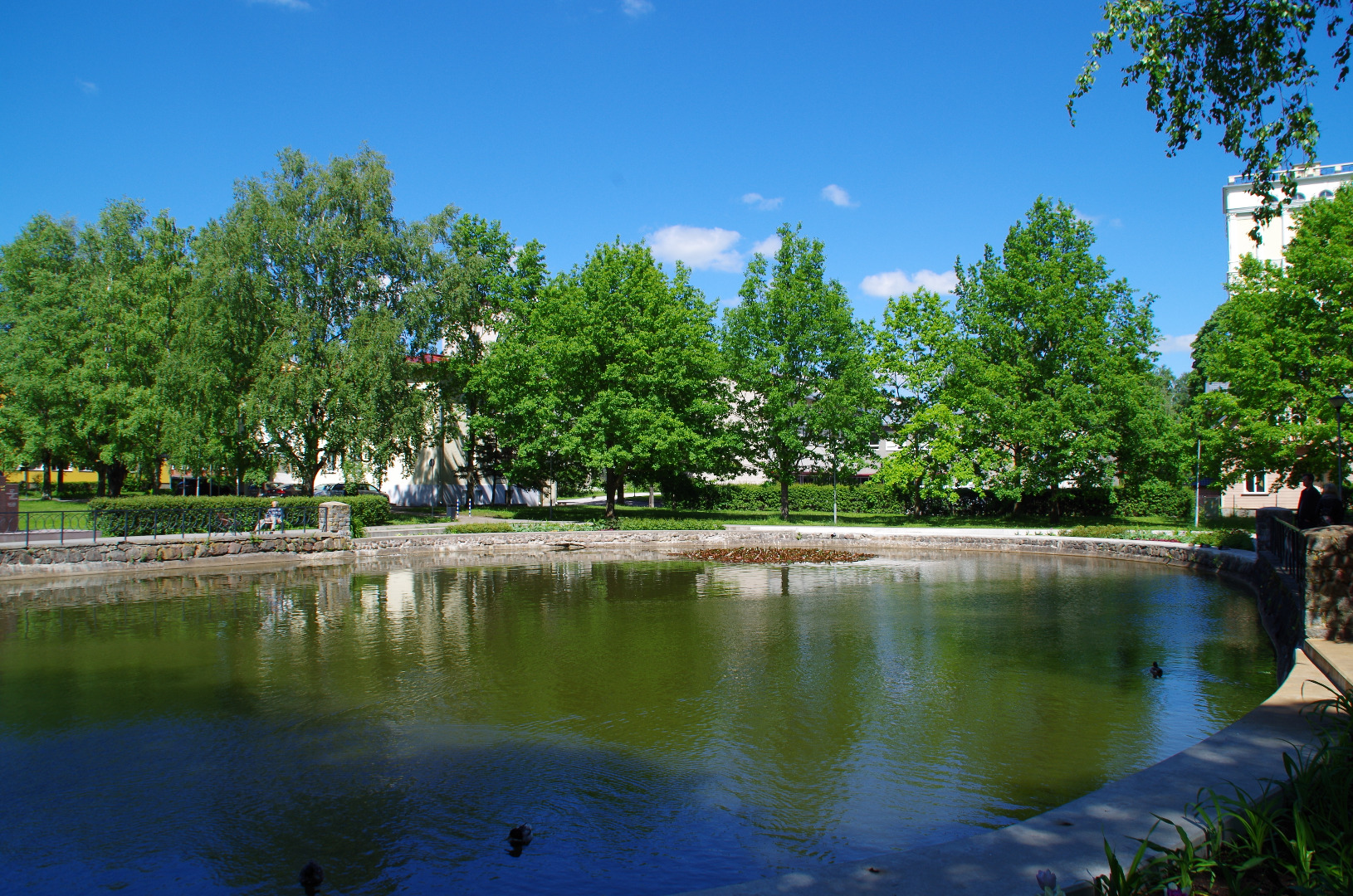 N. Valger Theatre "Vanemuise" in a park next to a small house next to a tigue, in the back of Tiigi Street, new houses rephoto
