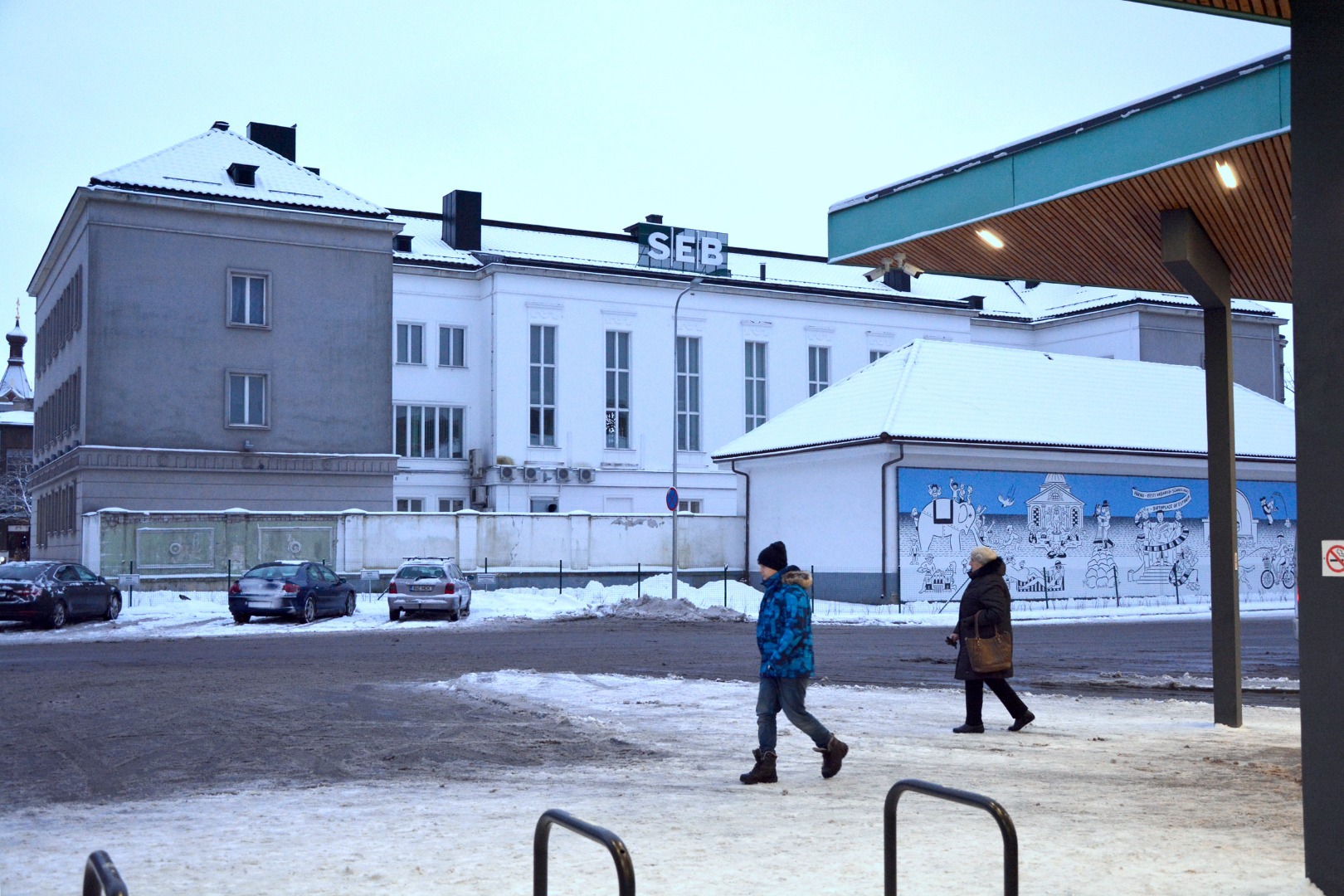 Natalie Valger is sitting on the Pärnu Railway Station Perron Pipe rephoto
