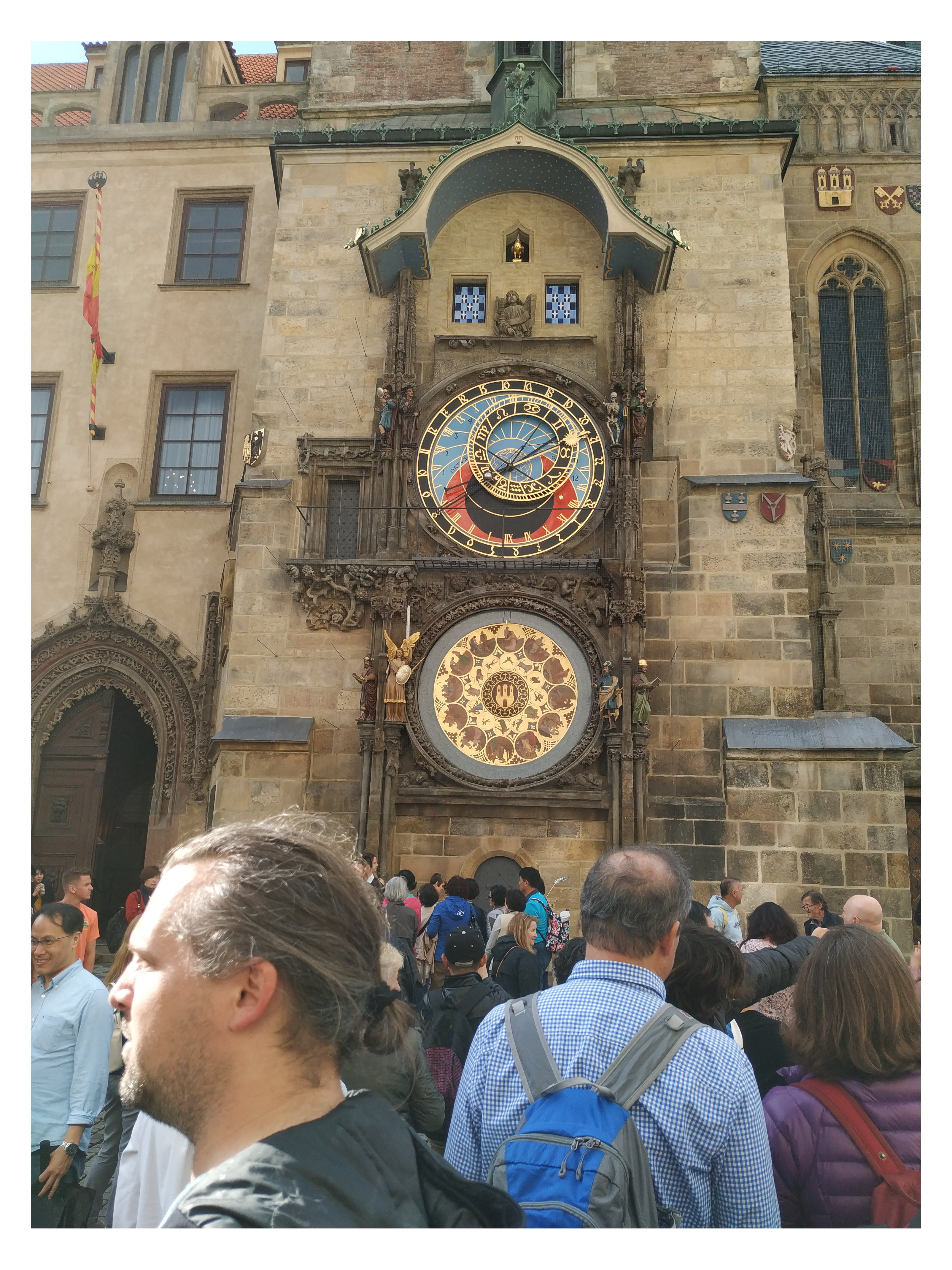 [façade with clock of City Hall. Prague] (Loc) rephoto