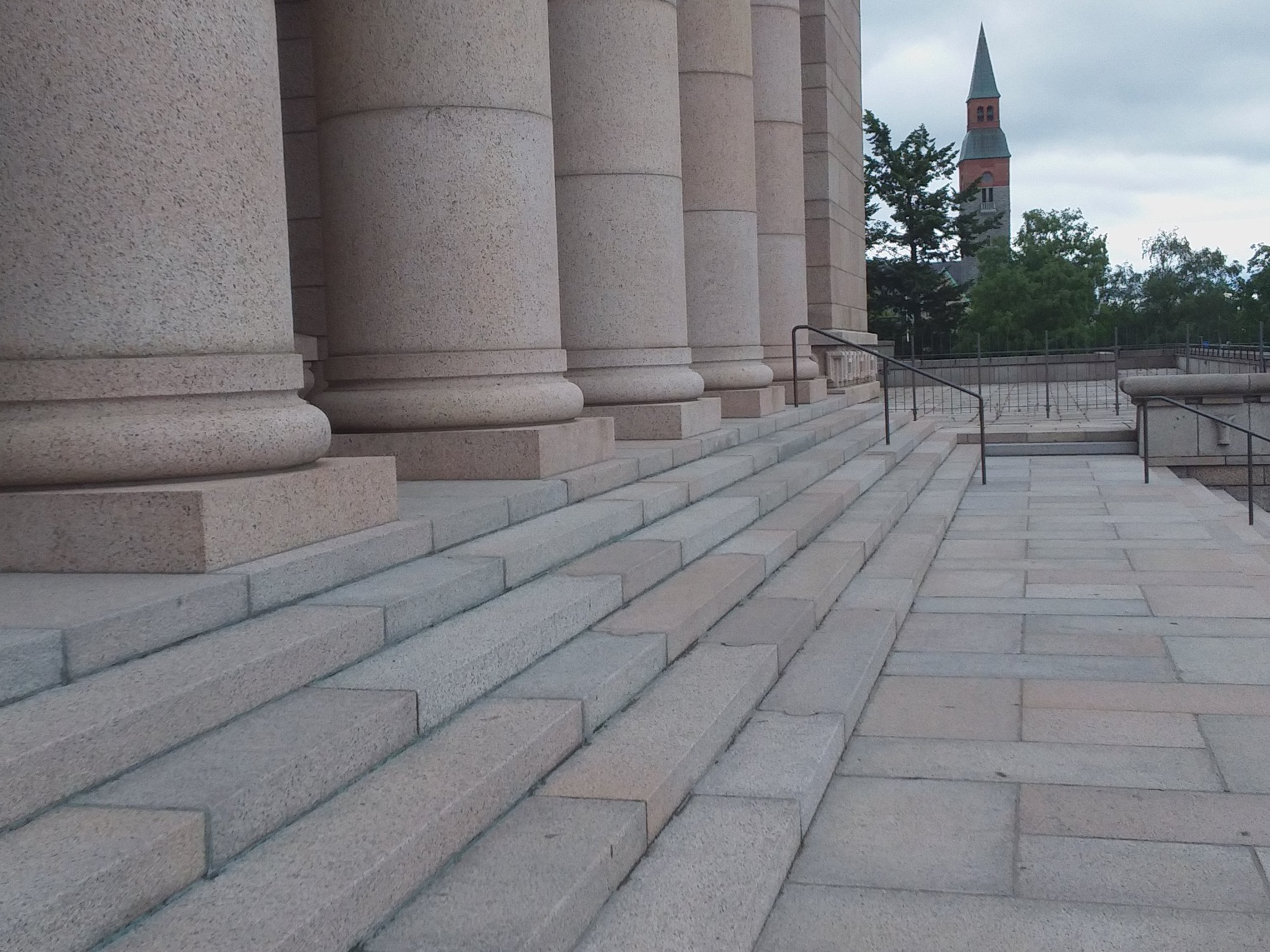 Mannerheimintie 30. Men (People?) On the stairs of the House of Representatives, following a demonstration demanding higher education democracy. rephoto
