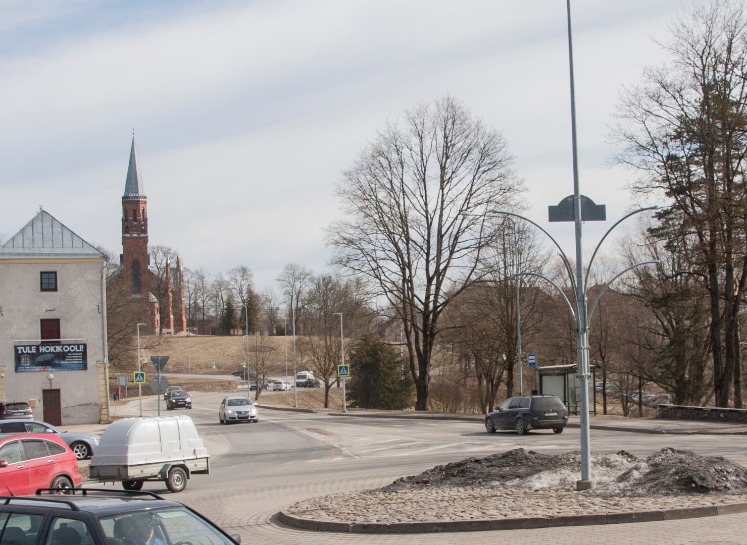 fotopostkaart, Viljandi, Vaksali tee, Pauluse kirik, munakivihunnikud, vaade Kantreküla poolt u 1910 foto J.Riet rephoto