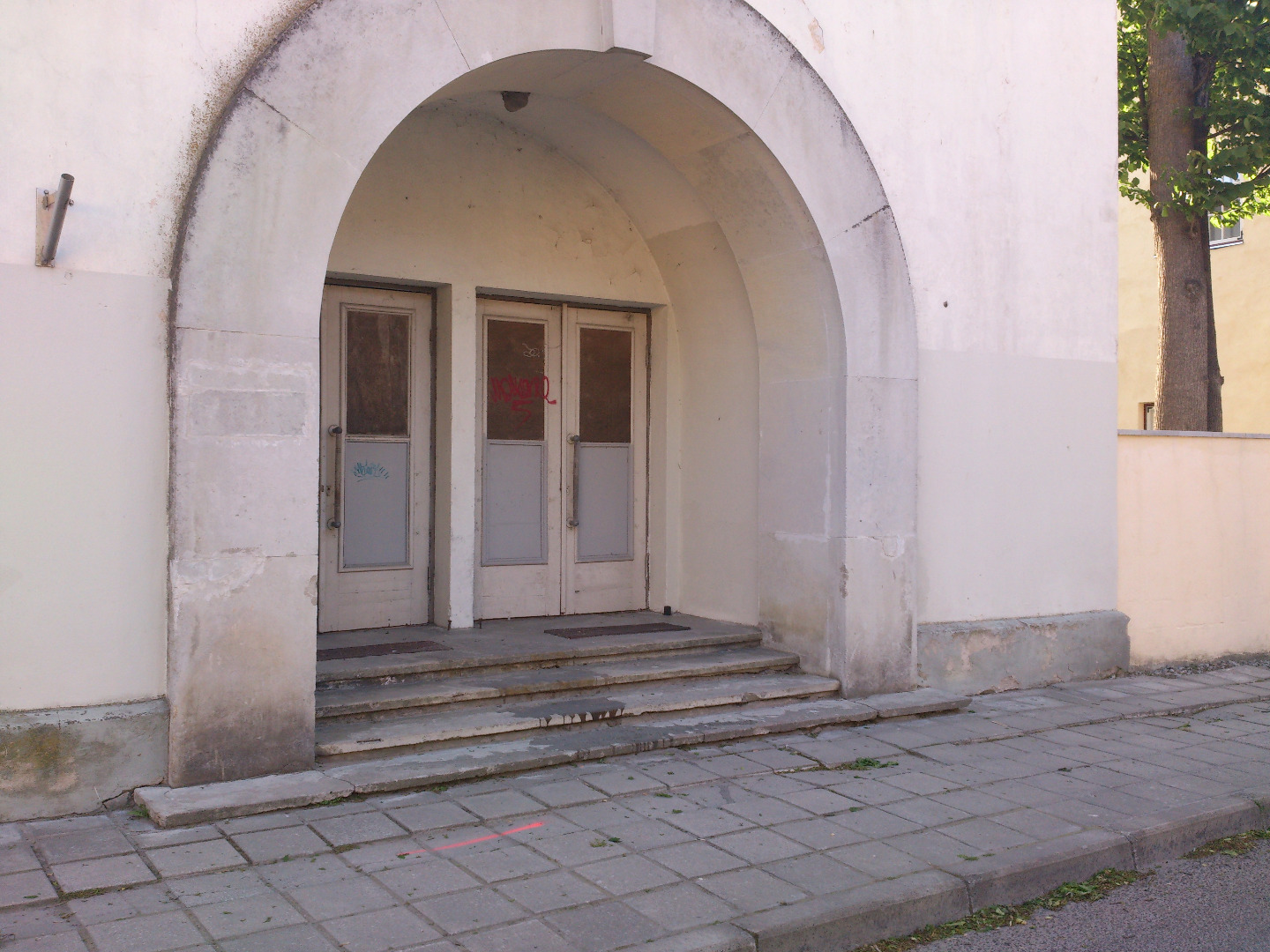 Visitors enter another film show in the cinema in October rephoto