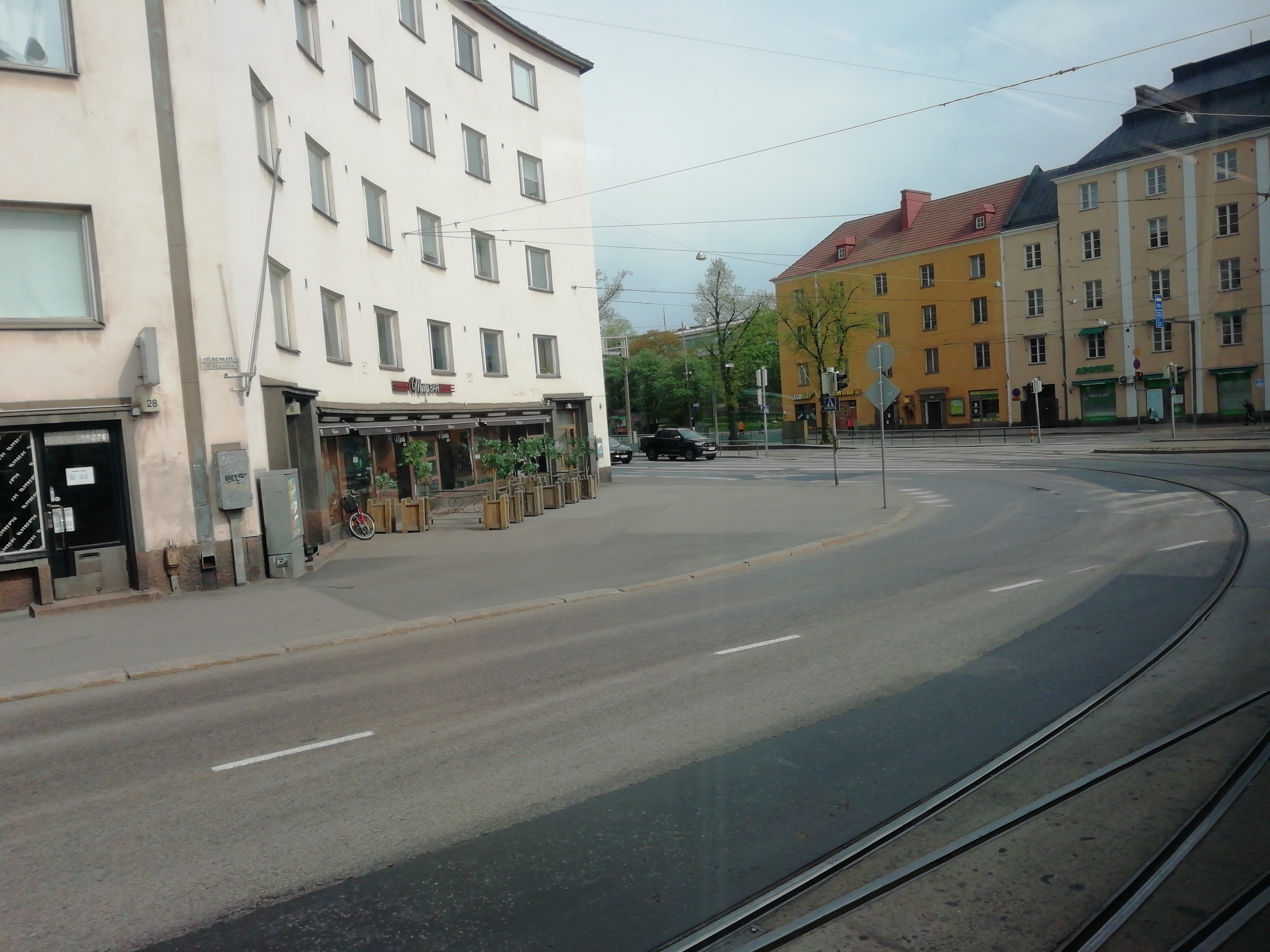 Sturenkatu 26, 27, 29. Sturenkatu 26 in front of the left Pajunen Oy colonisation movement rephoto