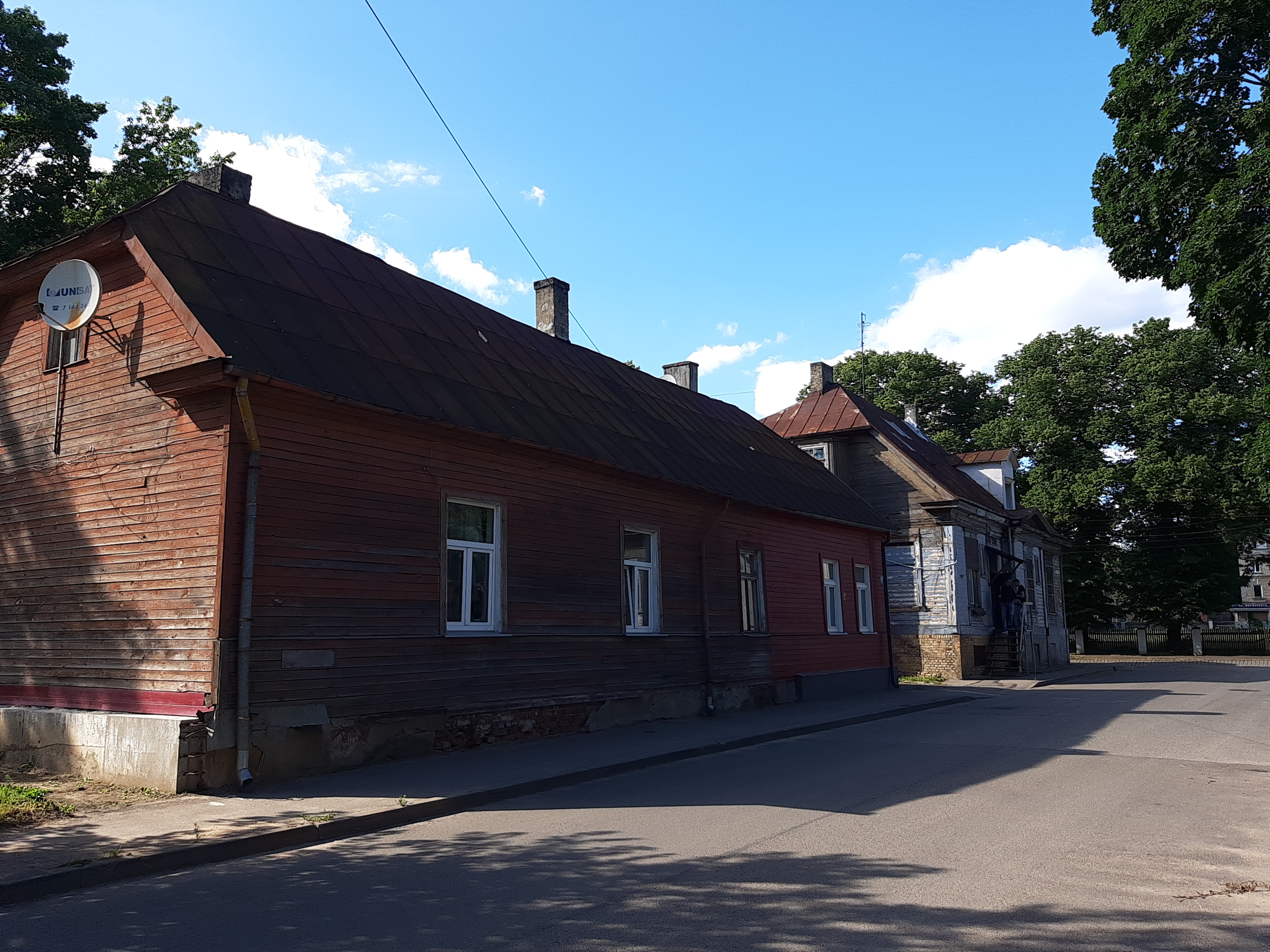 Riga. Wooden residential buildings in Toma Street rephoto