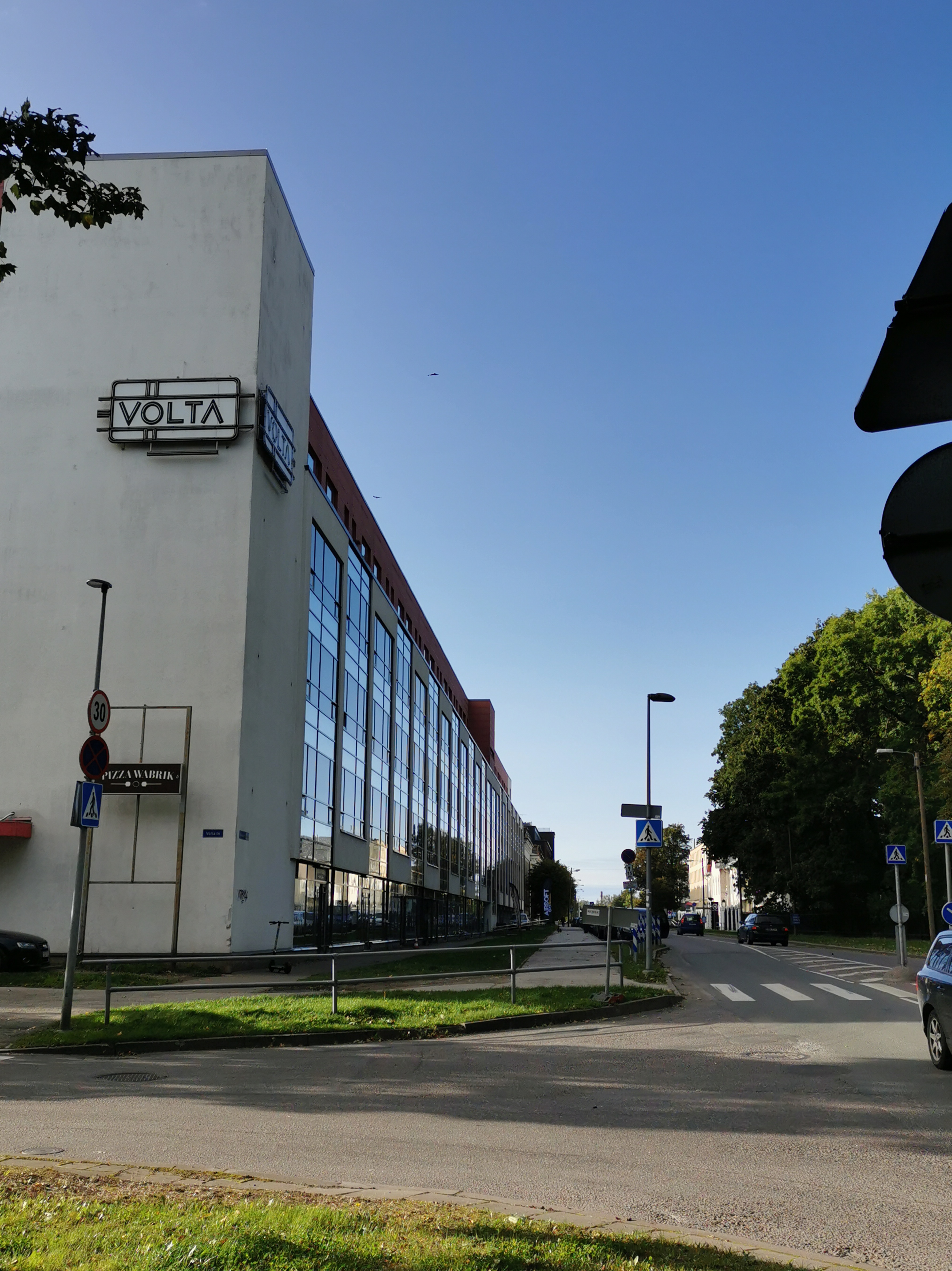 The corner of Volta and Industrial Street. View "Volta" factory building. rephoto