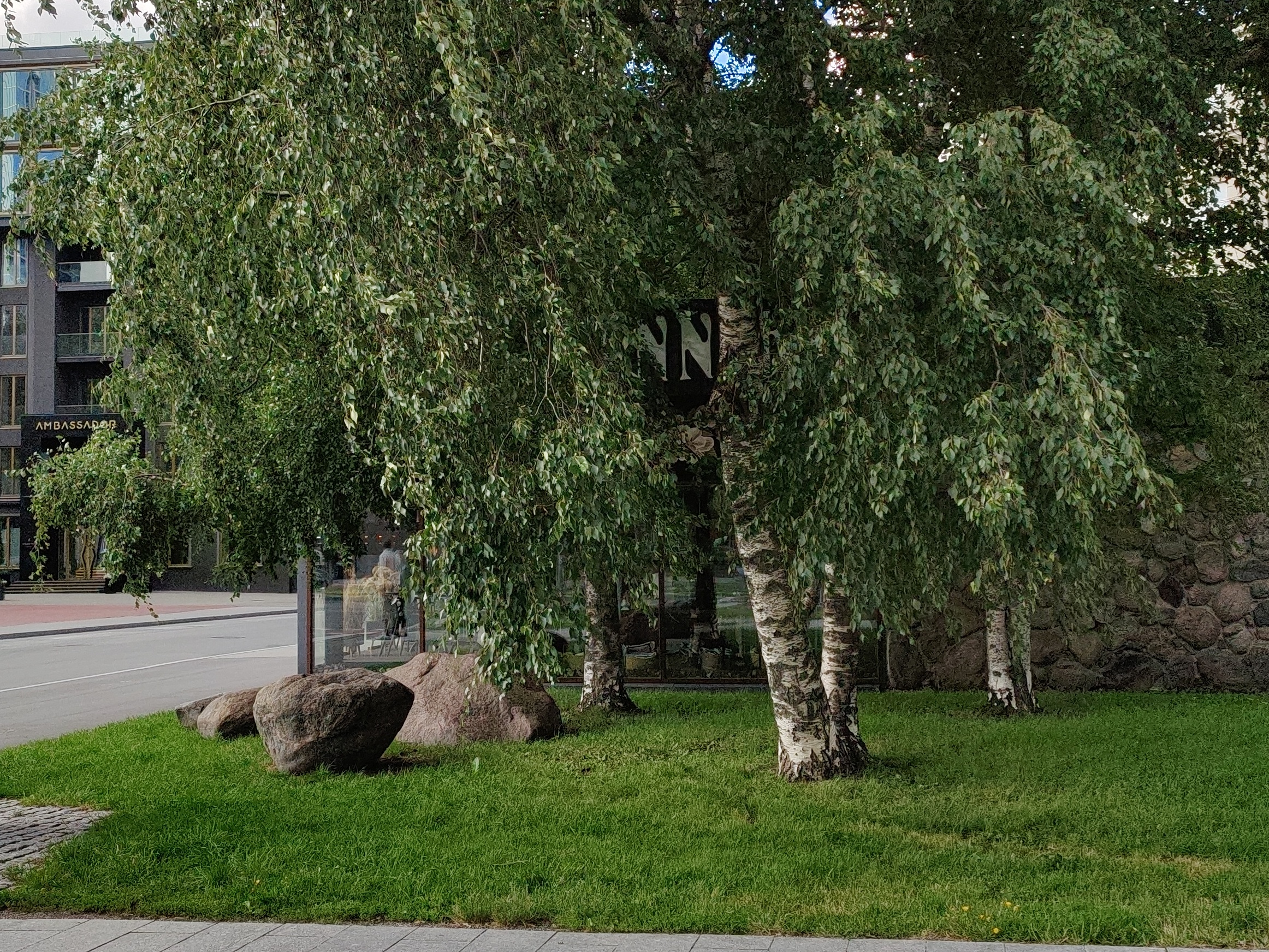Flower shop in Tallinn on the crossroads of V. Reiman and Gonsiori Street. Outdoor view. rephoto