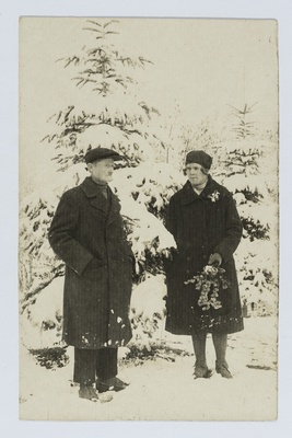 August Kaevats kaaslasega lumiste kuuskede juures  similar photo
