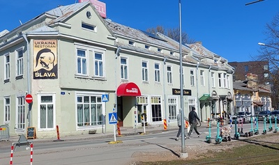 Elu- ja ärihoone Tallinnas Kopli tn, ees trammitee. Arhitekt Viktor Jenken rephoto