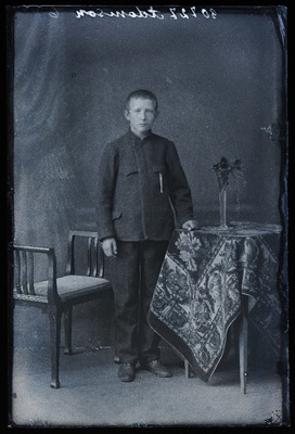 Koolipoiss Aleksander Adamson.  similar photo