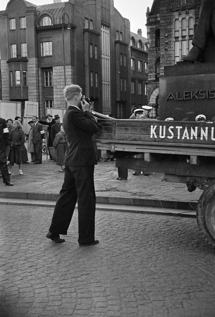Demonstration at the Railway Tower, photographer.