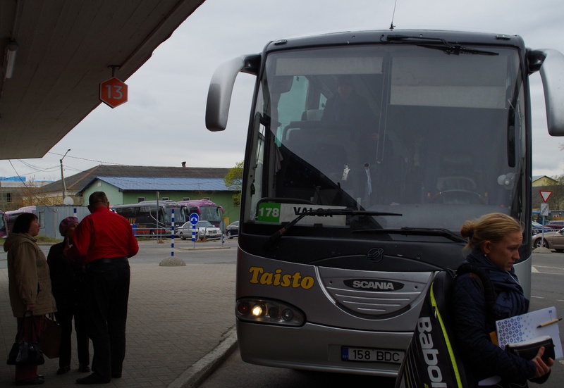 Ella Toomsalu (in the left) with its Canadian guests at Tallinn bus station, a line bus in the background. rephoto