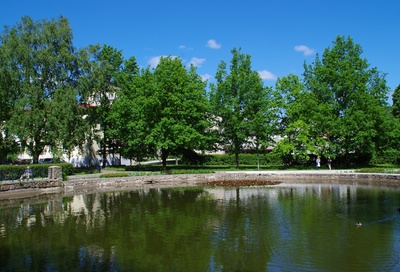 View of apartments in Tartu on Tiigi Street and fire fighter clockboard rephoto