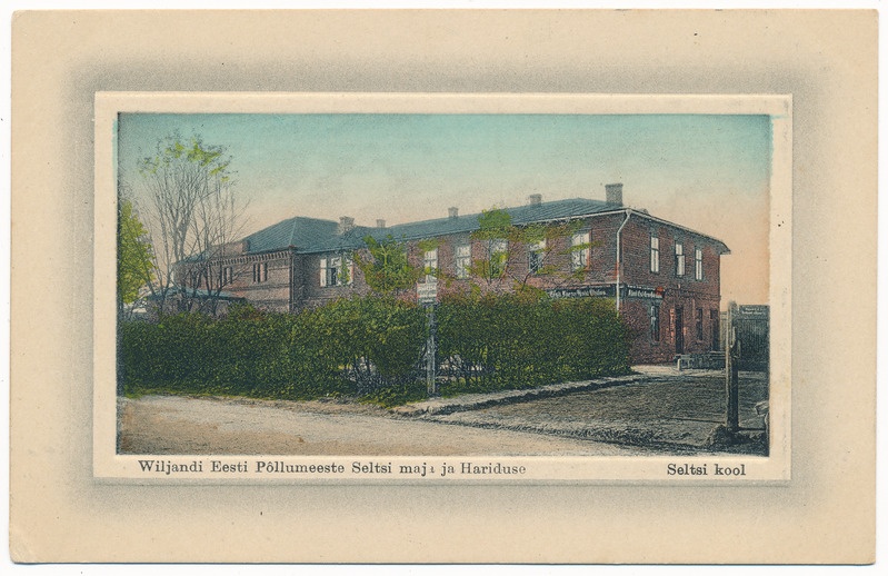 trükipostkaart albumis, Viljandi, põllumeeste seltsi maja (Jakobsoni tn 42), u 1910, kirjastus A. Tõllasepp, koloreeritud (kool hoones 1908-st)